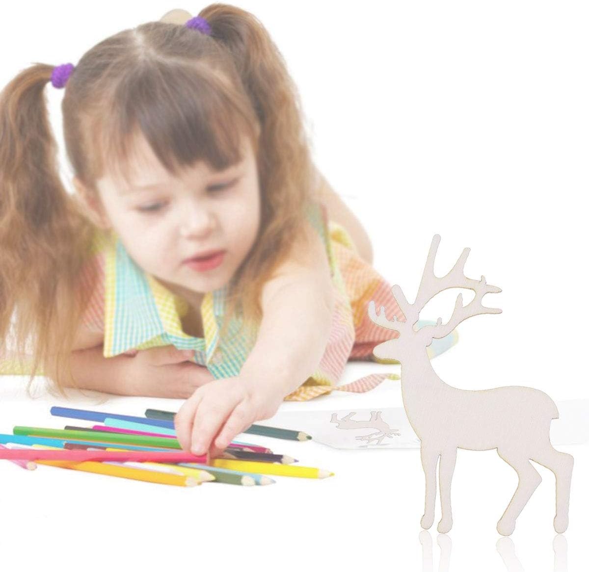 Child with colored pencils and a white deer figurine on a white background