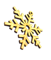 Gold snowflake ornament on a white background
