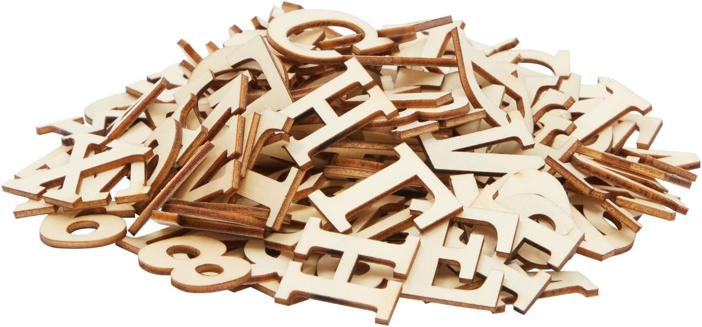 Assorted wooden letters and numbers on a white background