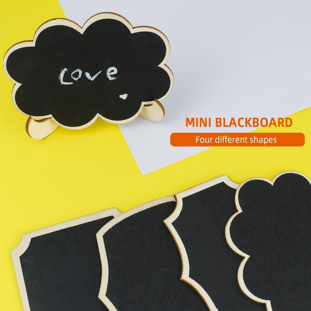 Mini blackboard with cloud shape on a yellow background