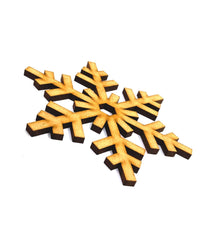 Wooden snowflake-shaped puzzle on a white background