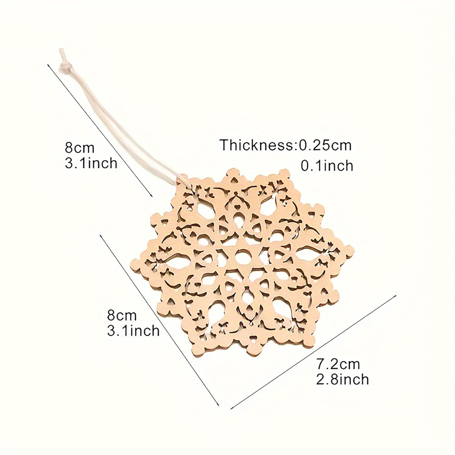 Decorative lace-like object with measurements on a white background