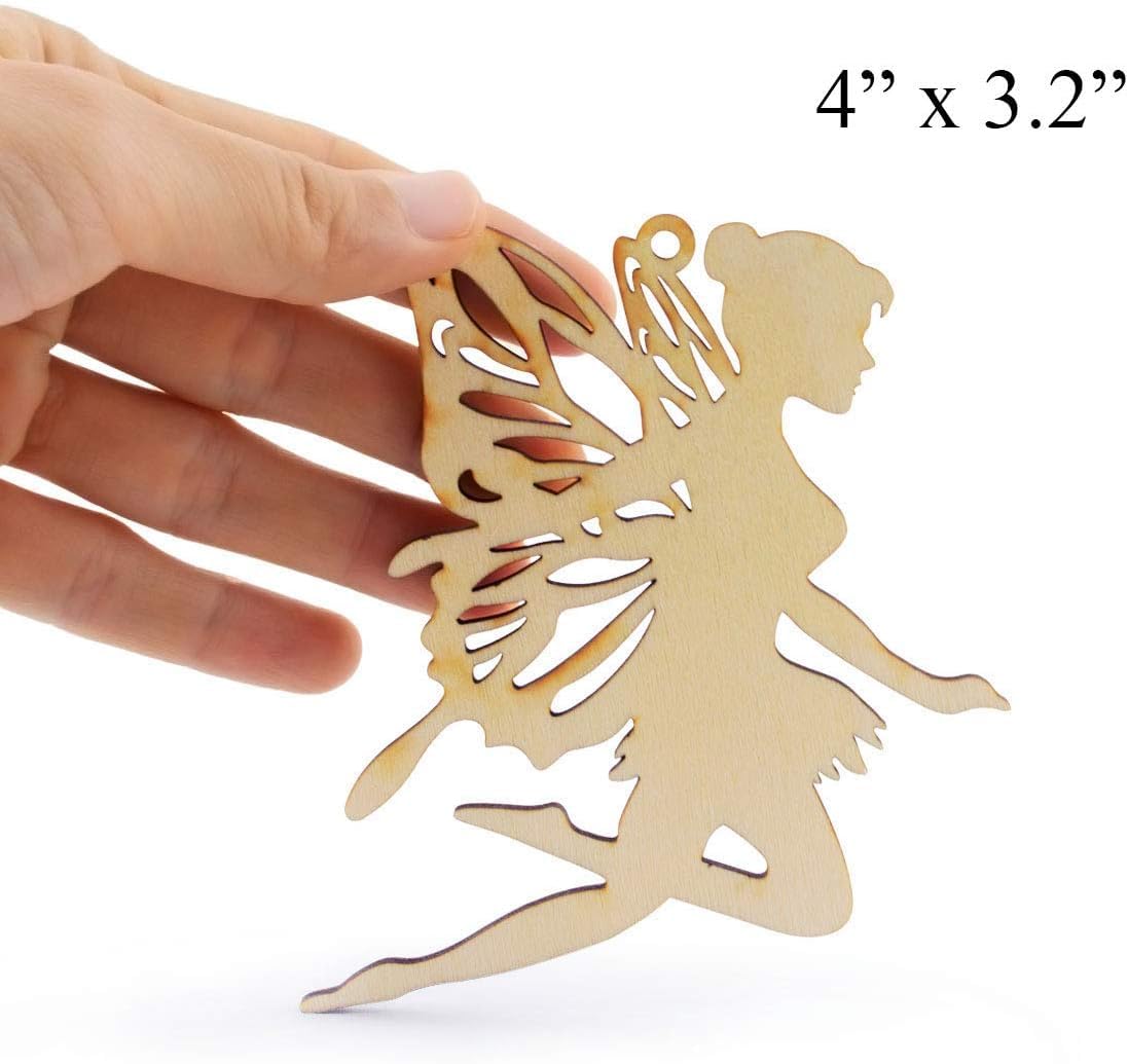 Wooden fairy silhouette held by a hand with dimensions displayed