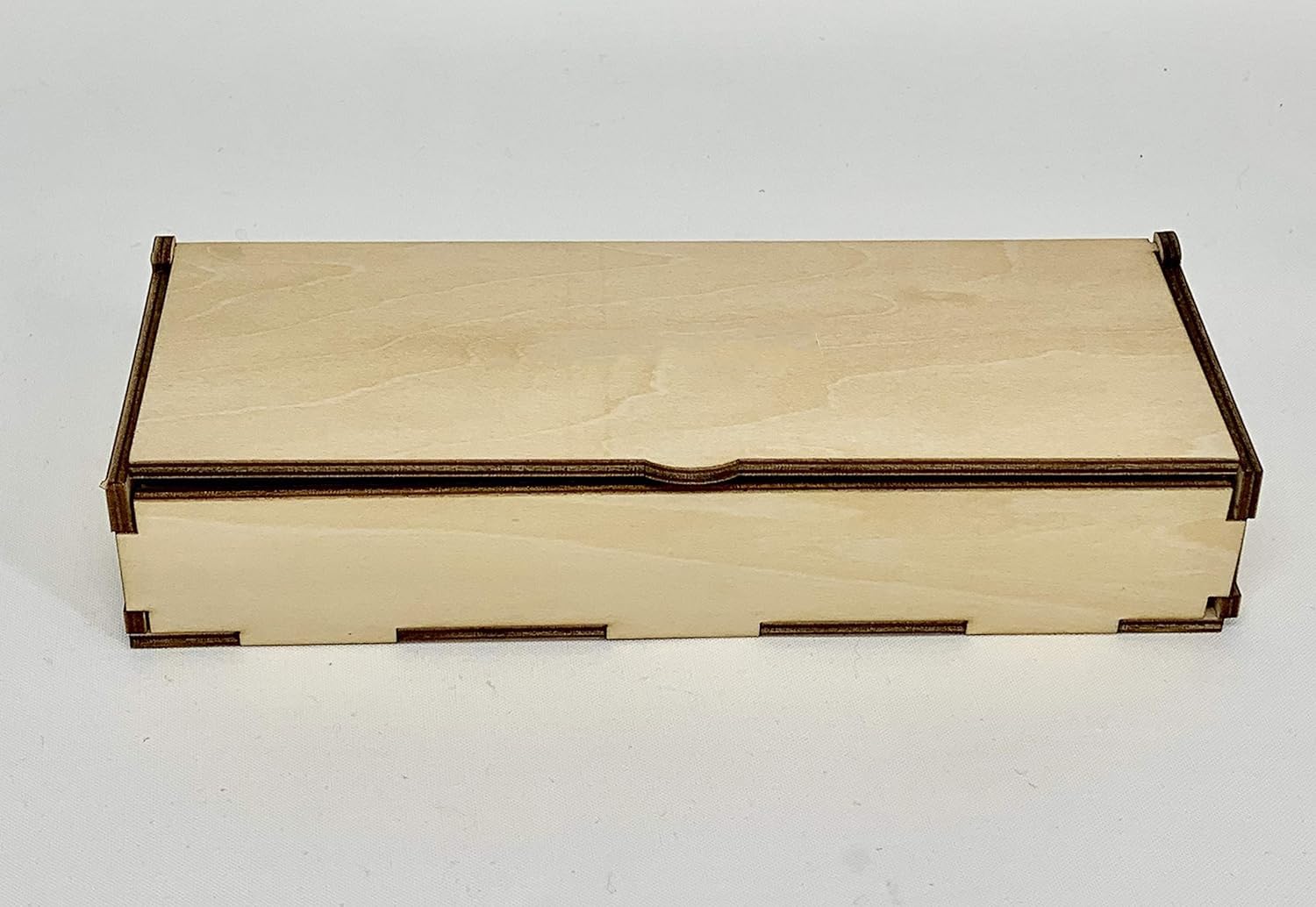 Wooden box with a hinged lid on a white background