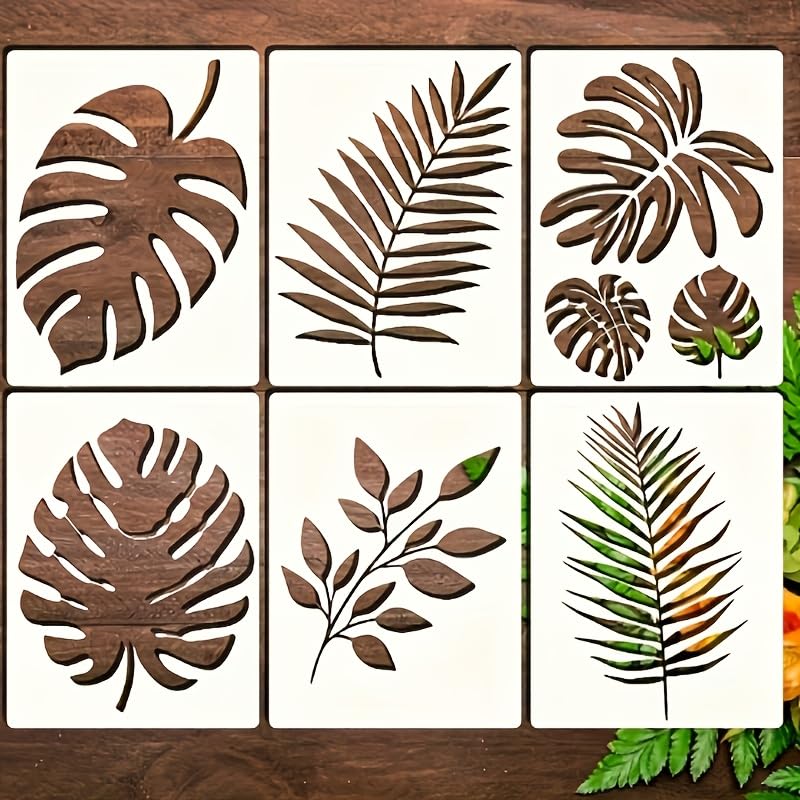 Set of leaf-shaped wooden coasters on a wooden surface