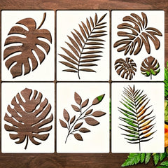 Set of leaf-shaped wooden coasters on a wooden surface