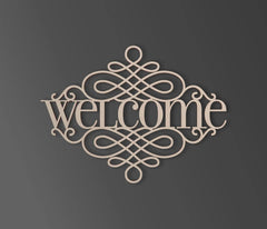 Decorative metal welcome sign with intricate designs on a dark background