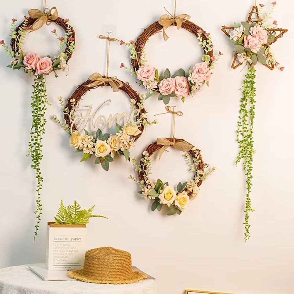 Decorative wreaths with flowers and greenery on a wall