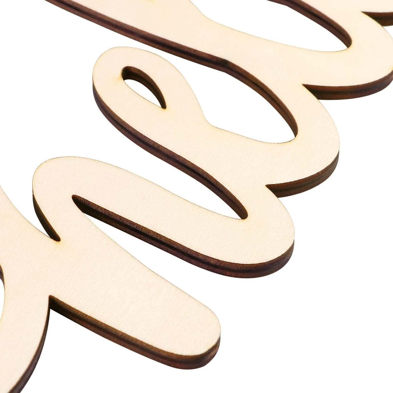Wooden letter 'S' cutouts on a white background