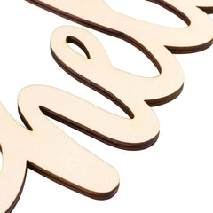 Wooden letter 'S' cutouts on a white background
