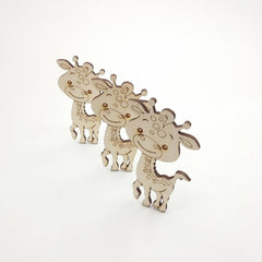 Three wooden giraffe toys on a white background