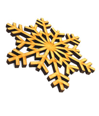 Decorative snowflake with black and gold design on a white background