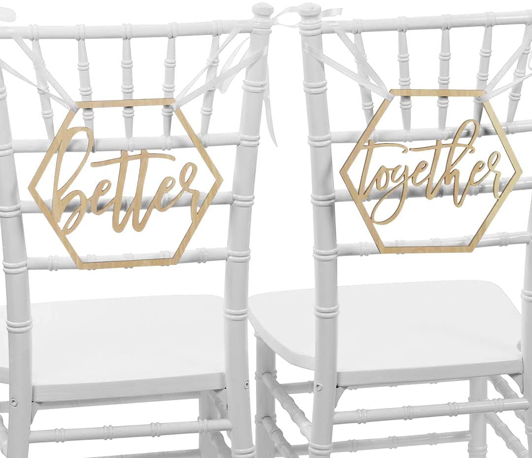White chairs with gold 'better together' signs on a white background