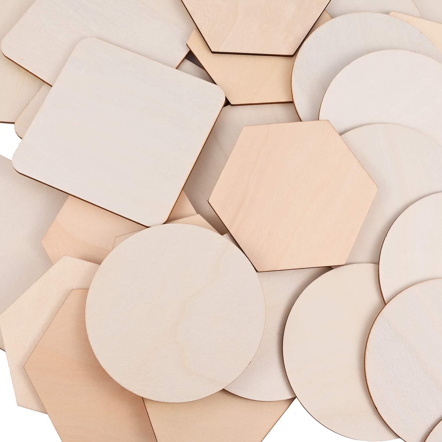 Collection of beige and brown ceramic tiles with geometric shapes on a white background