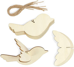 Wooden bird shapes with wings detached on a white background