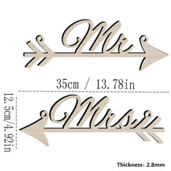 Decorative wooden arrow with 'Mrs.' text and measurements on a white background