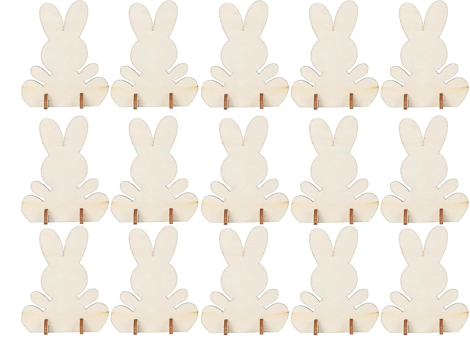 Set of 16 white bunny-shaped candles with wooden holders on a white background
