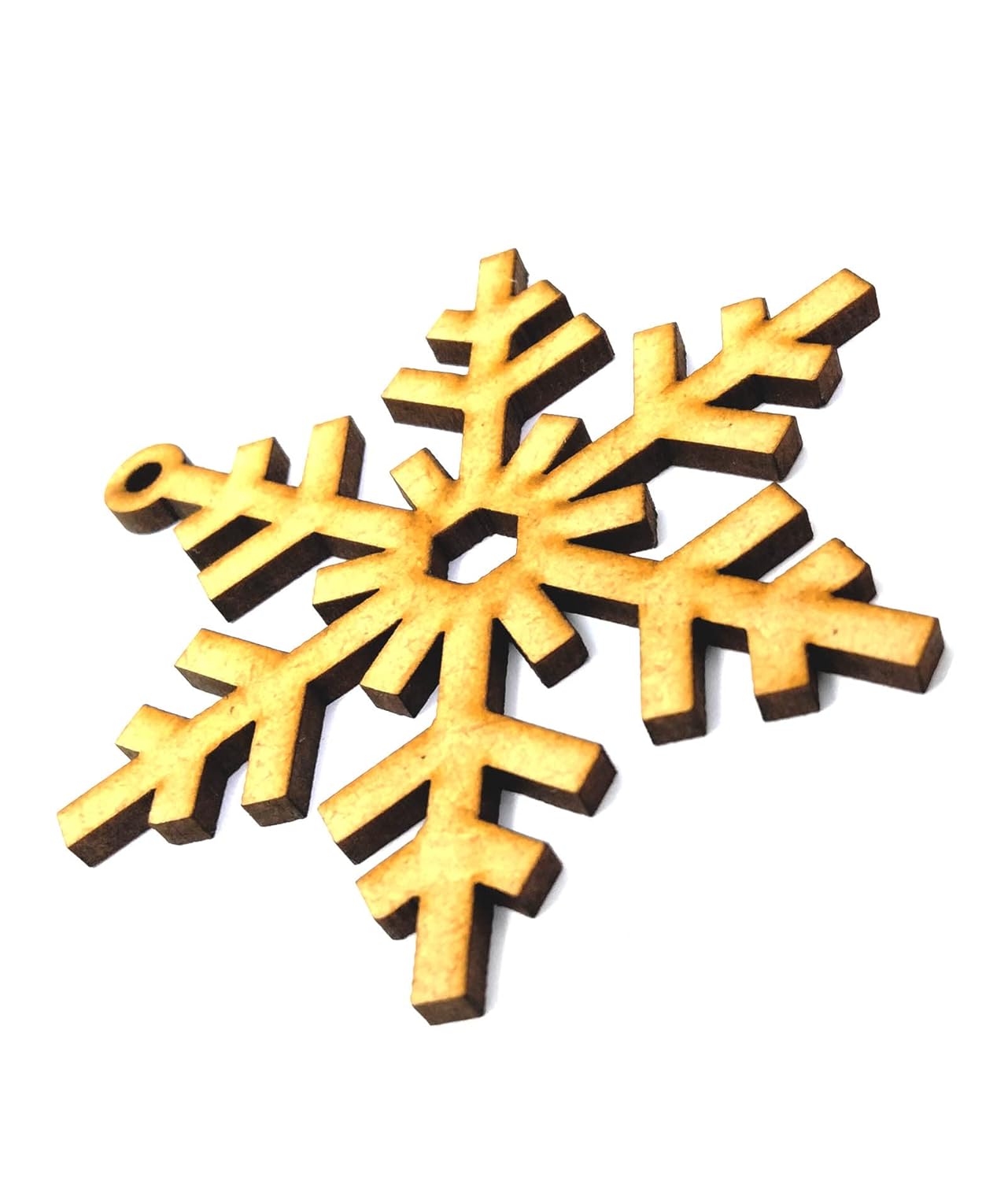 Wooden snowflake ornament on a white background