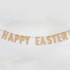 Wooden 'Happy Easter' banner on a white background
