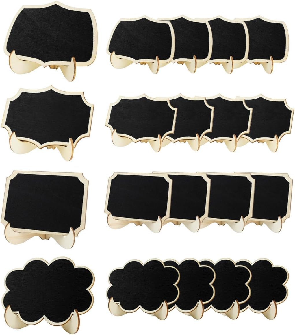 Set of small black chalkboards with gold frames on a white background