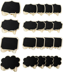 Set of small black chalkboards with gold frames on a white background