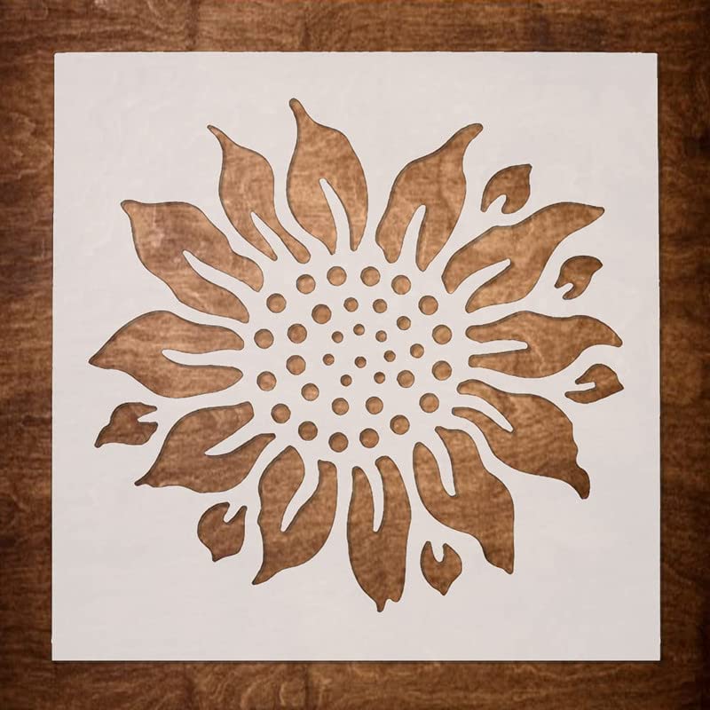 Decorative sunflower design on a white card with a wooden background