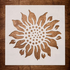 Decorative sunflower design on a white card with a wooden background