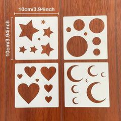 Set of stencils with star, circle, heart, and moon designs on a wooden surface.