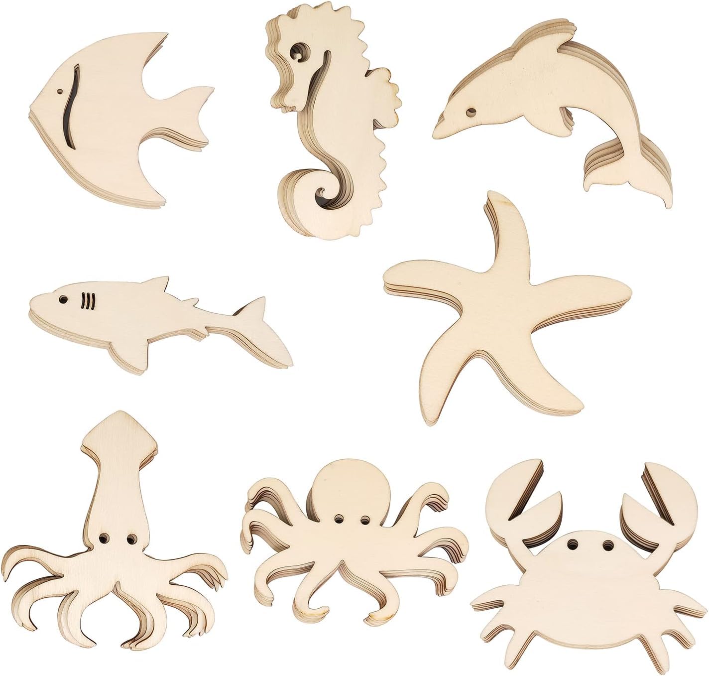 Set of wooden sea creature shapes on a white background