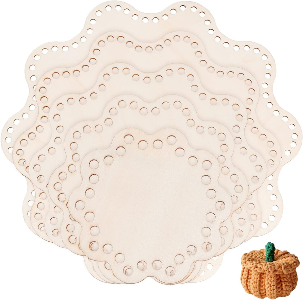 Set of beige doily placemats with a small crochet pumpkin on a white background