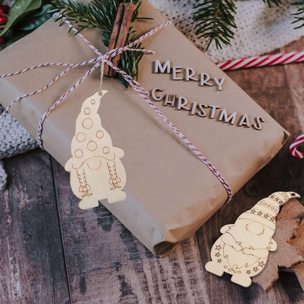 Gift wrapped in brown paper with 'Merry Christmas' tag and wooden gnome decorations on a rustic wooden surface.