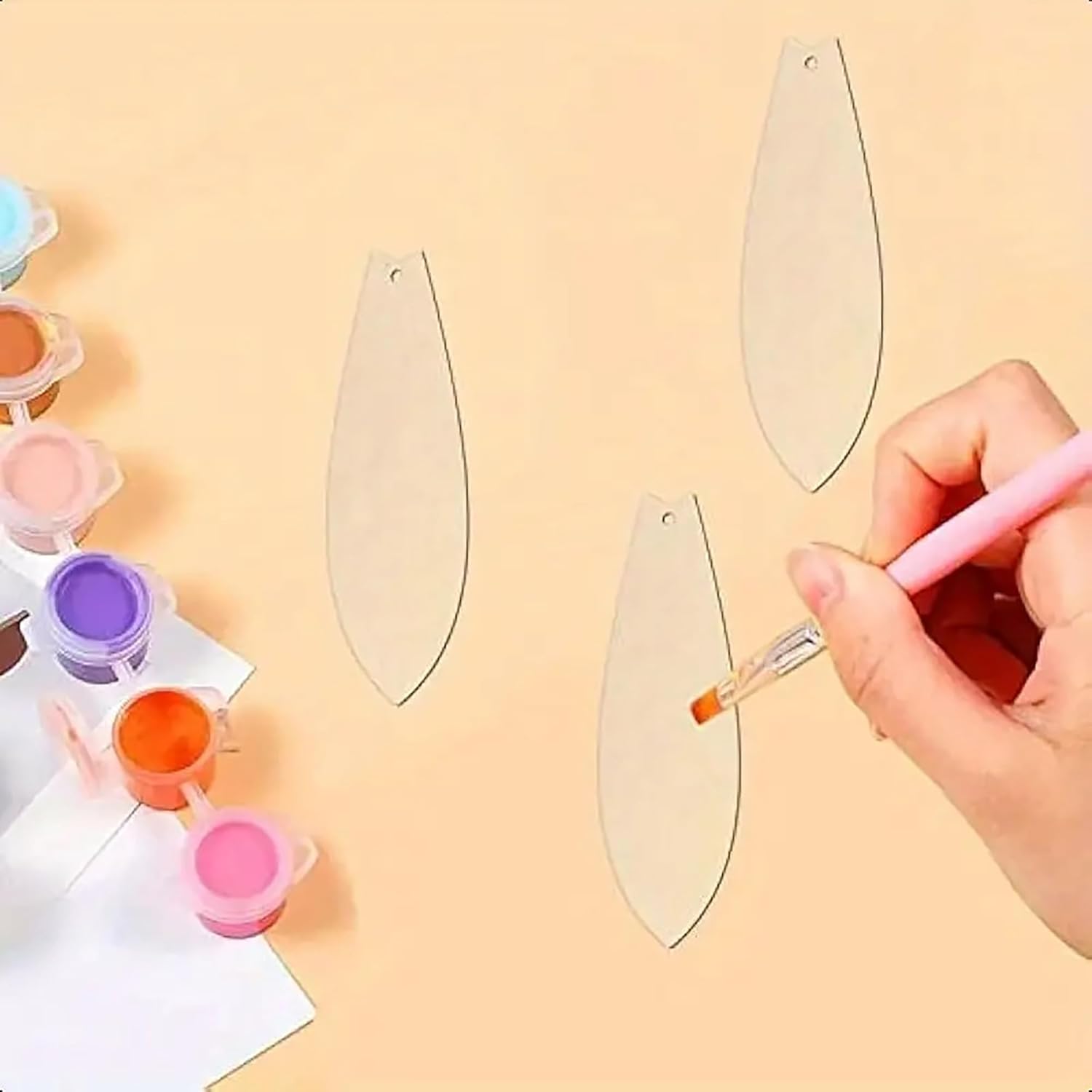 Person painting a decorative item with a brush on a beige background