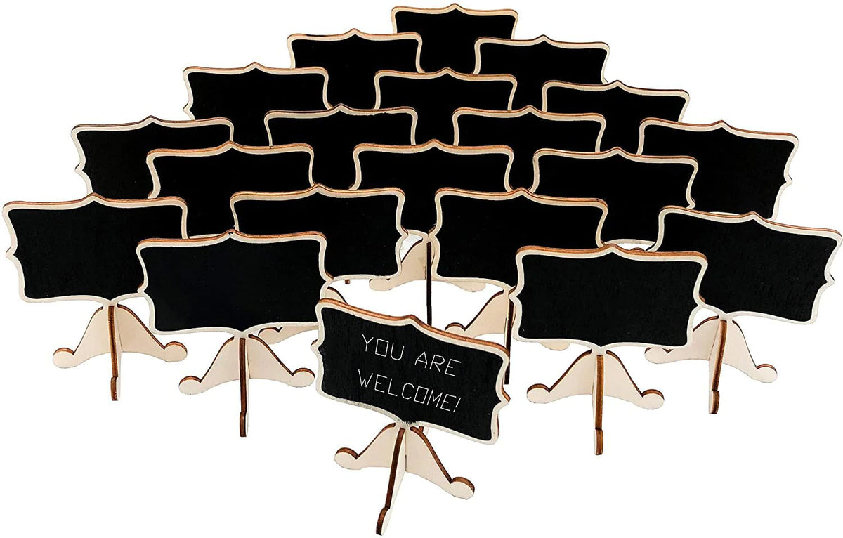 Set of small black chalkboards with stands on a white background
