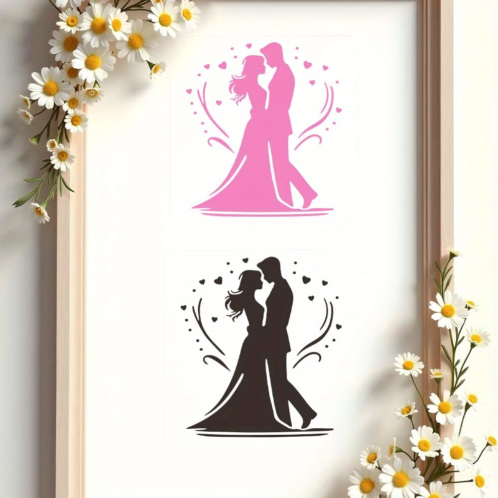Framed artwork with pink and black silhouettes of a couple surrounded by flowers.