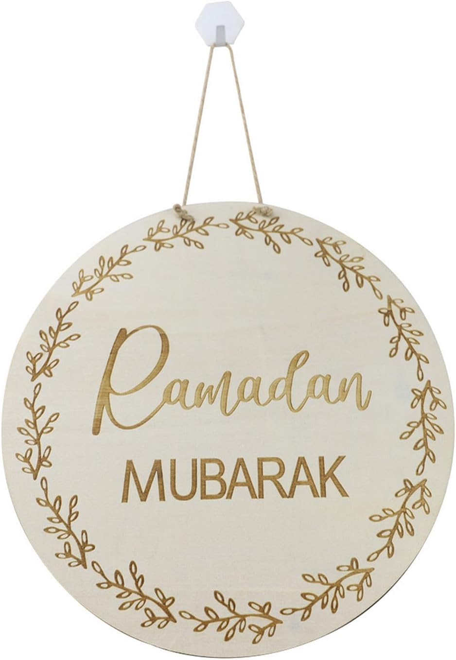 Round wooden sign with 'Ramadan Mubarak' in gold text on a white background