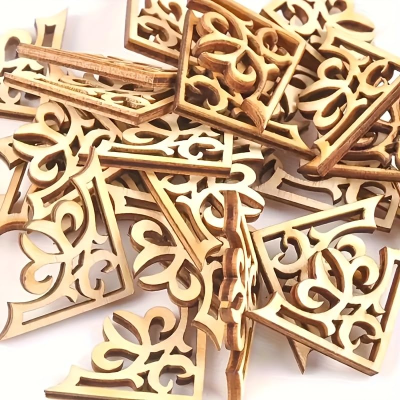 Wooden decorative pieces with intricate carvings on a white background