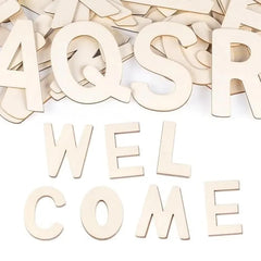 Wooden letters spelling 'WELCOME' on a white background