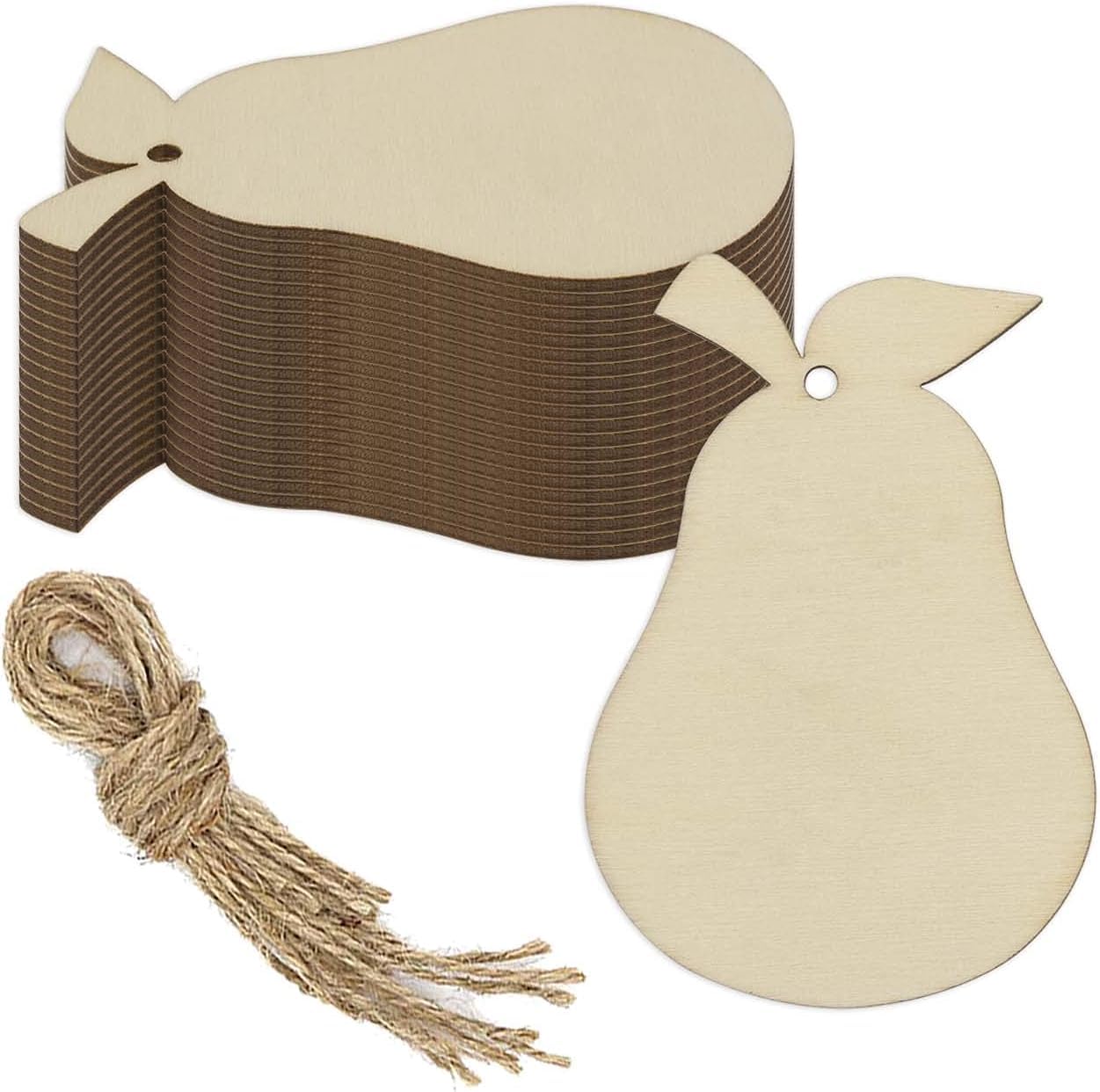 Stack of pear-shaped wooden tags with twine on a white background