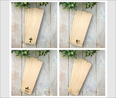 Four wooden signs with metal embellishments on a rustic wooden background