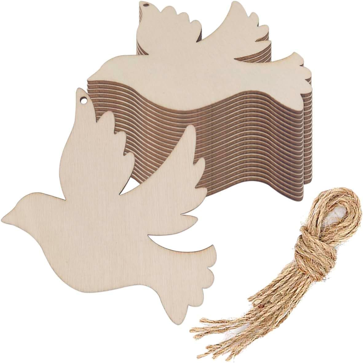 Stack of wooden dove shapes with a bundle of twine on a white background