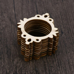 Wooden gear-like object on a dark wooden surface