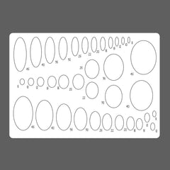 Sheet of oval and circular stencils with measurements on a gray background