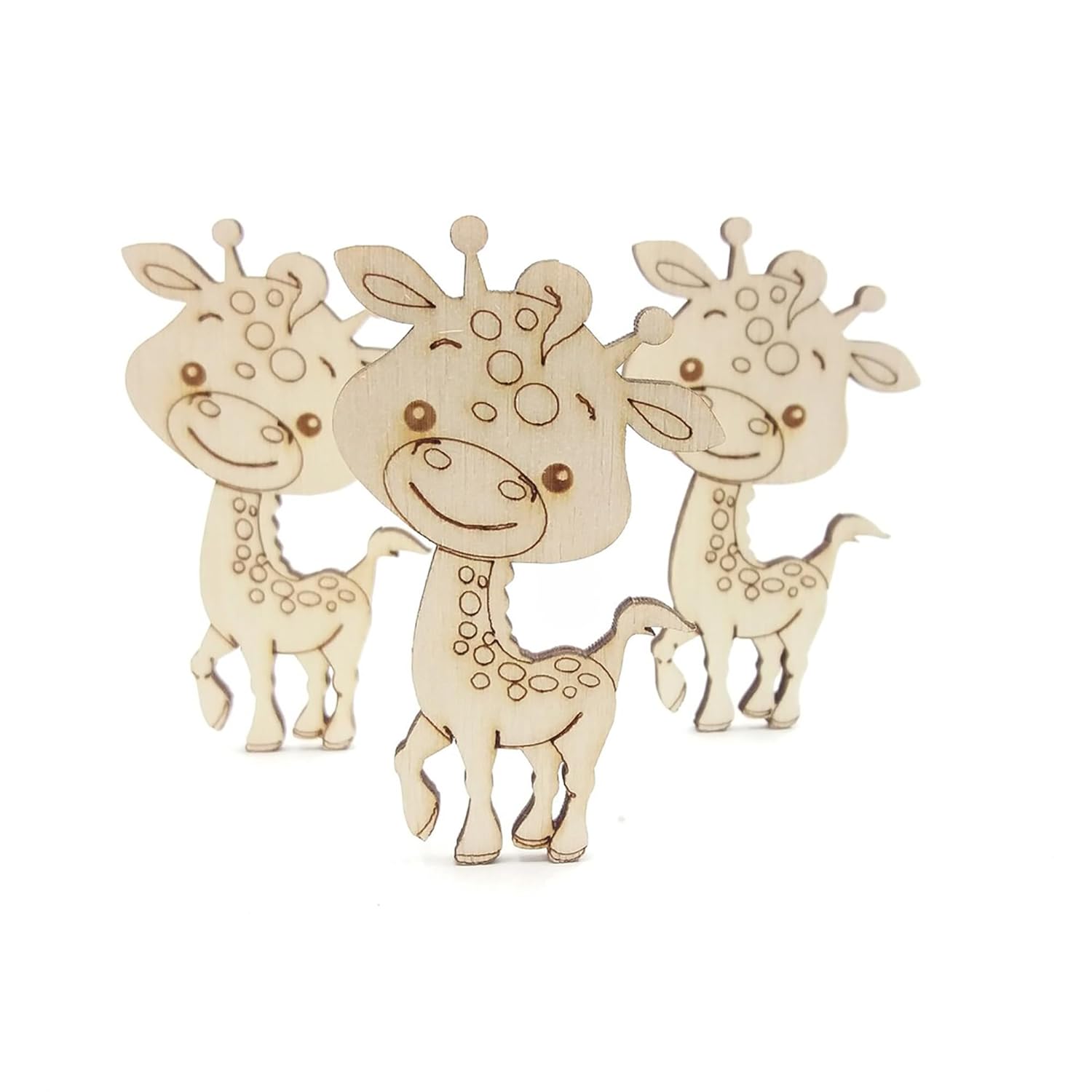 Three wooden giraffe toys on a white background