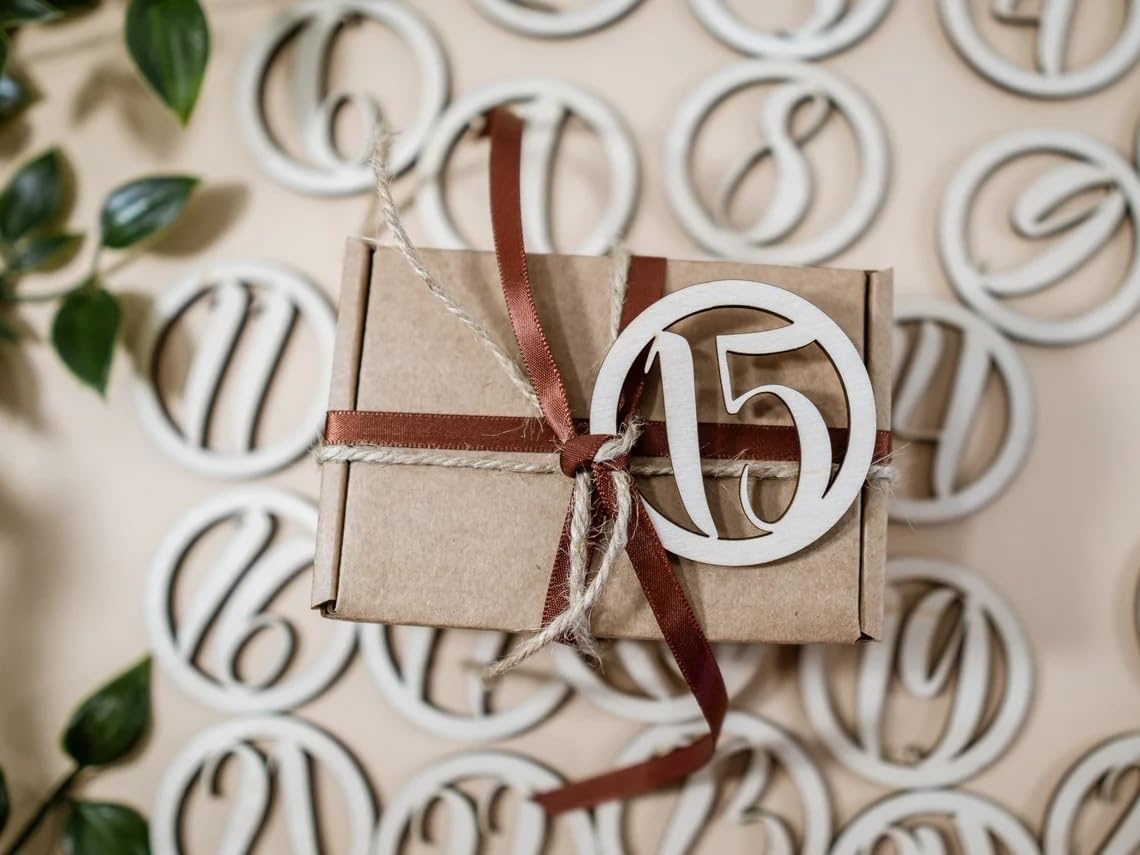 Gift box with a decorative number '15' on a patterned background