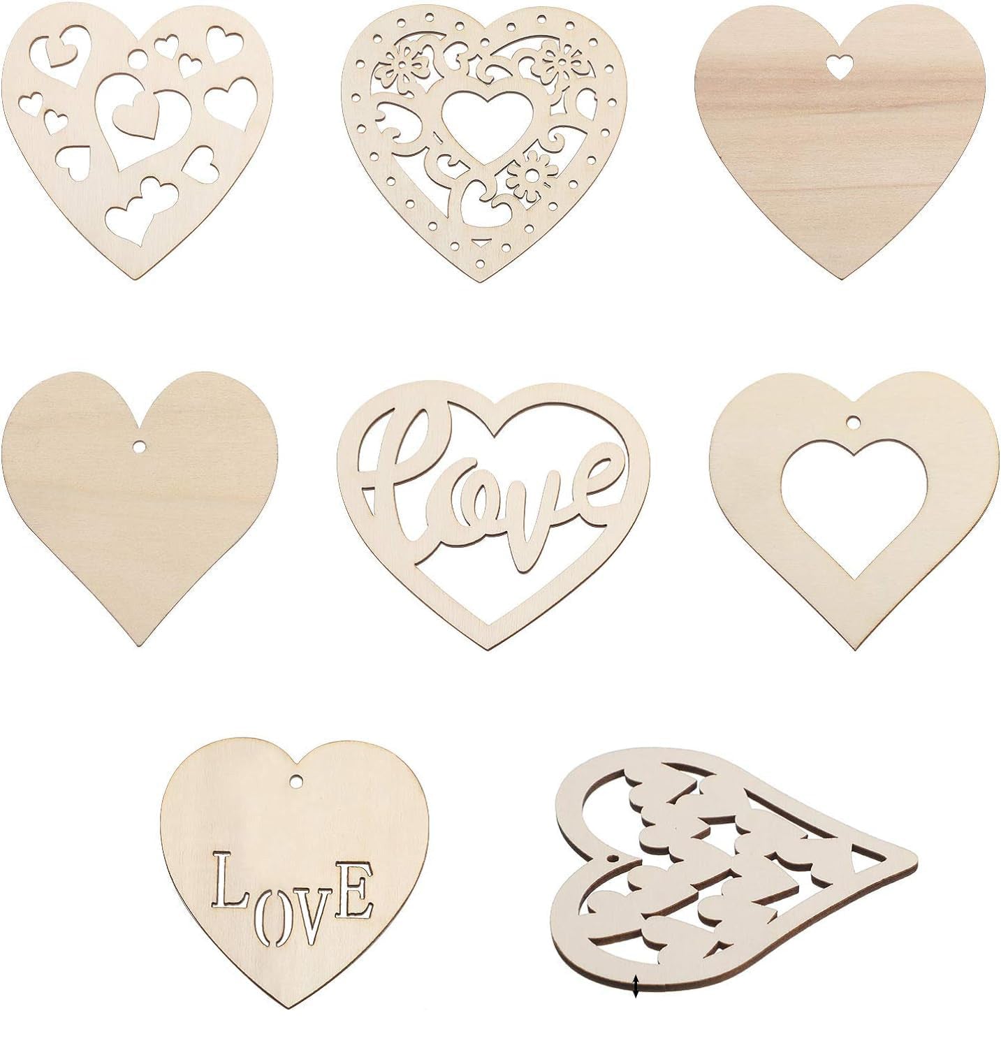 Set of wooden heart-shaped decorations with cut-out designs on a white background