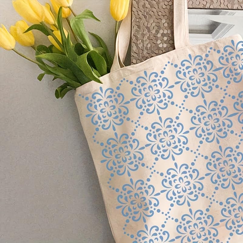 Tote bag with blue floral pattern and yellow tulips on a light gray background