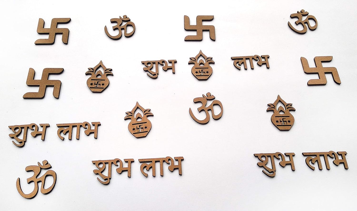 Set of wooden symbols including Swastikas and Om signs on a white background
