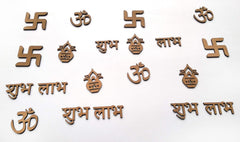 Set of wooden symbols including Swastikas and Om signs on a white background