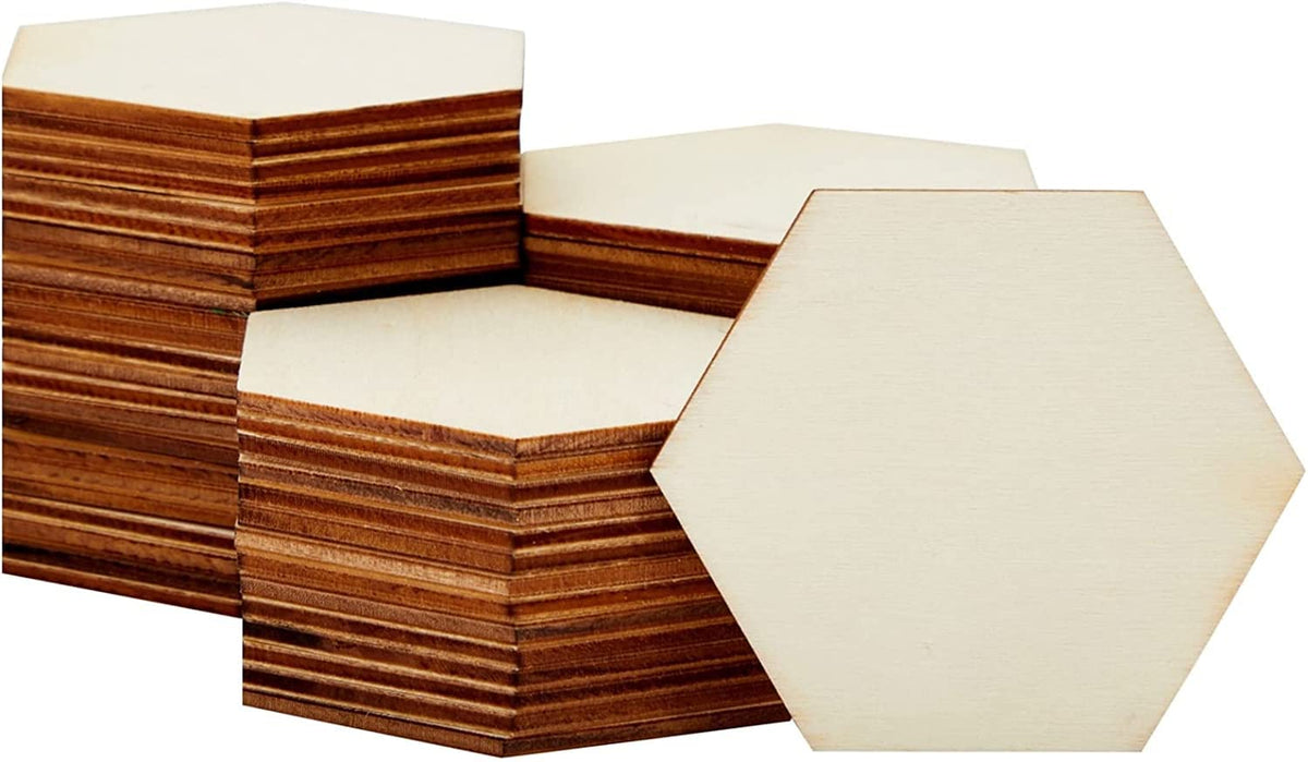 Hexagonal wooden coasters stacked on a white background