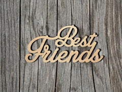 Wooden 'Best Friends' sign on a wooden background